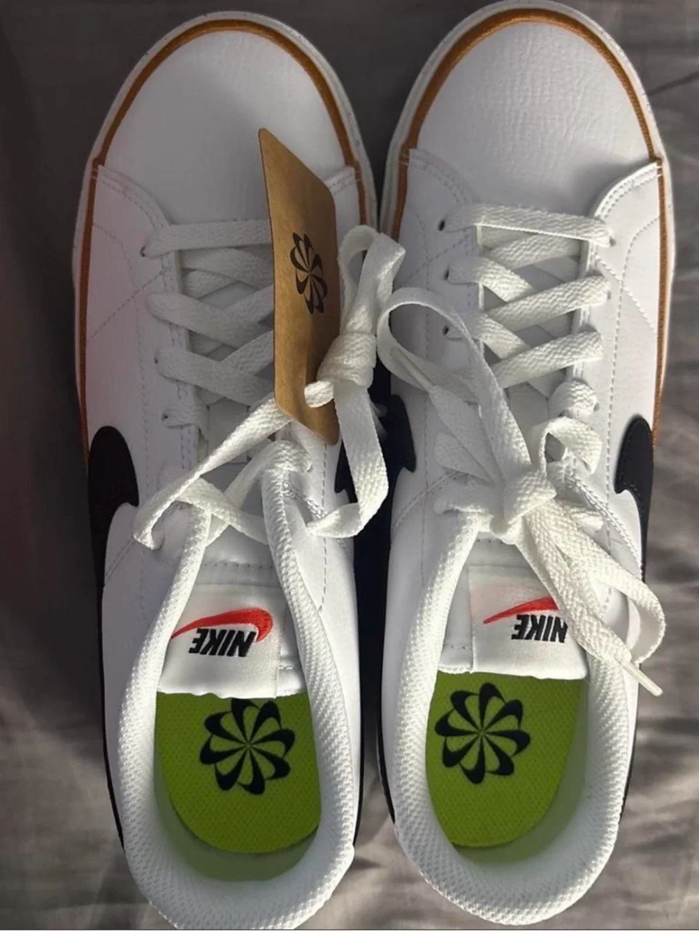 Nike Women’s White Sneakers with Black Swoosh and Brown Trim